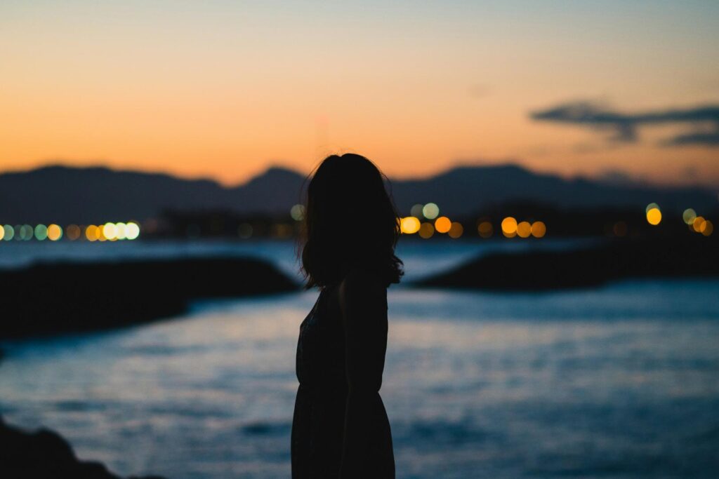 woman looking out to sea